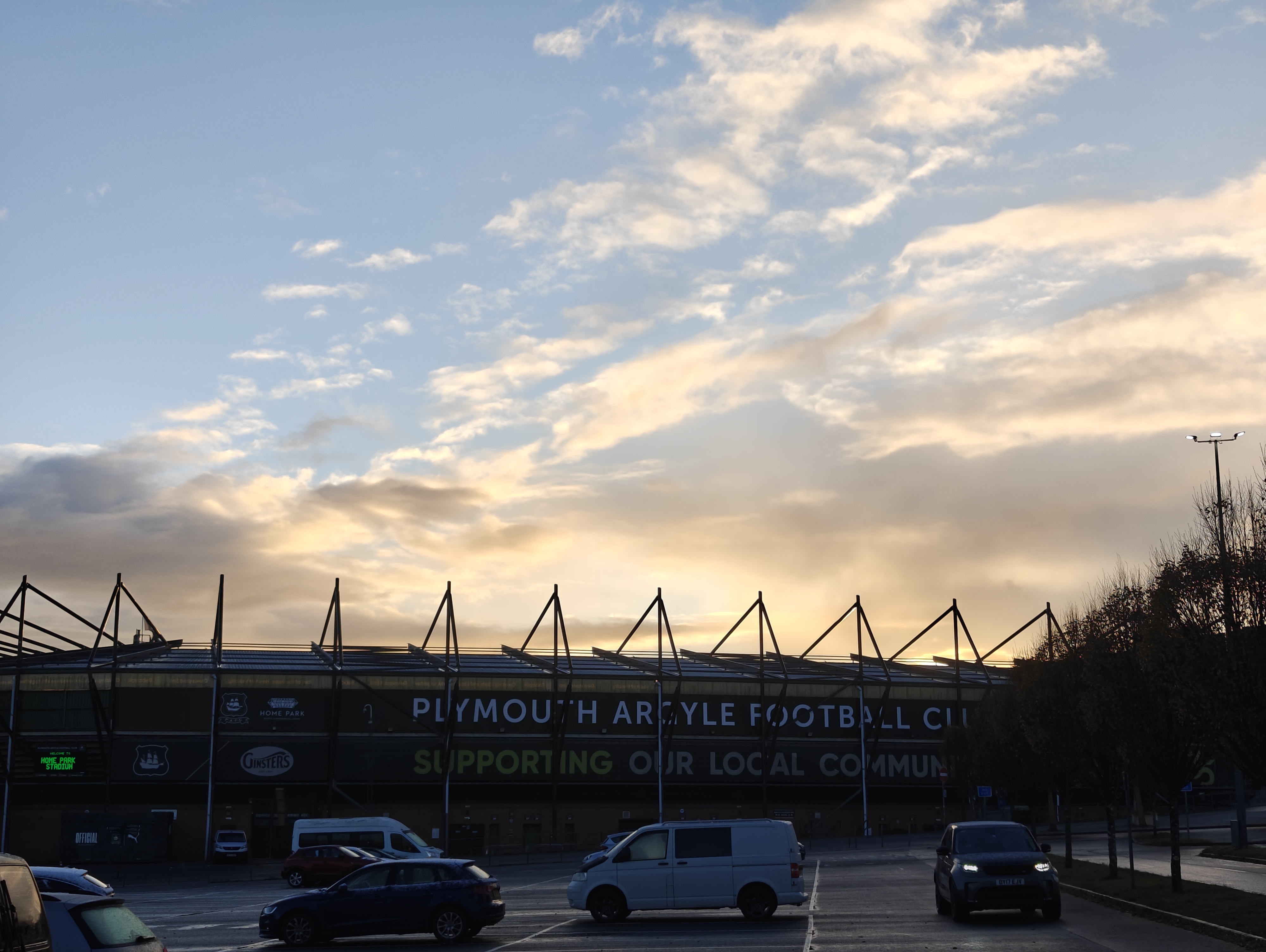 Home Park, Plymouth Argyles ground, with the sun rising behind it.
