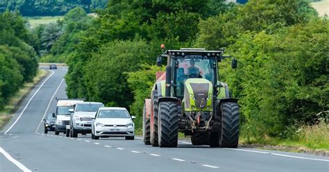 Cars stuck behind a tractor