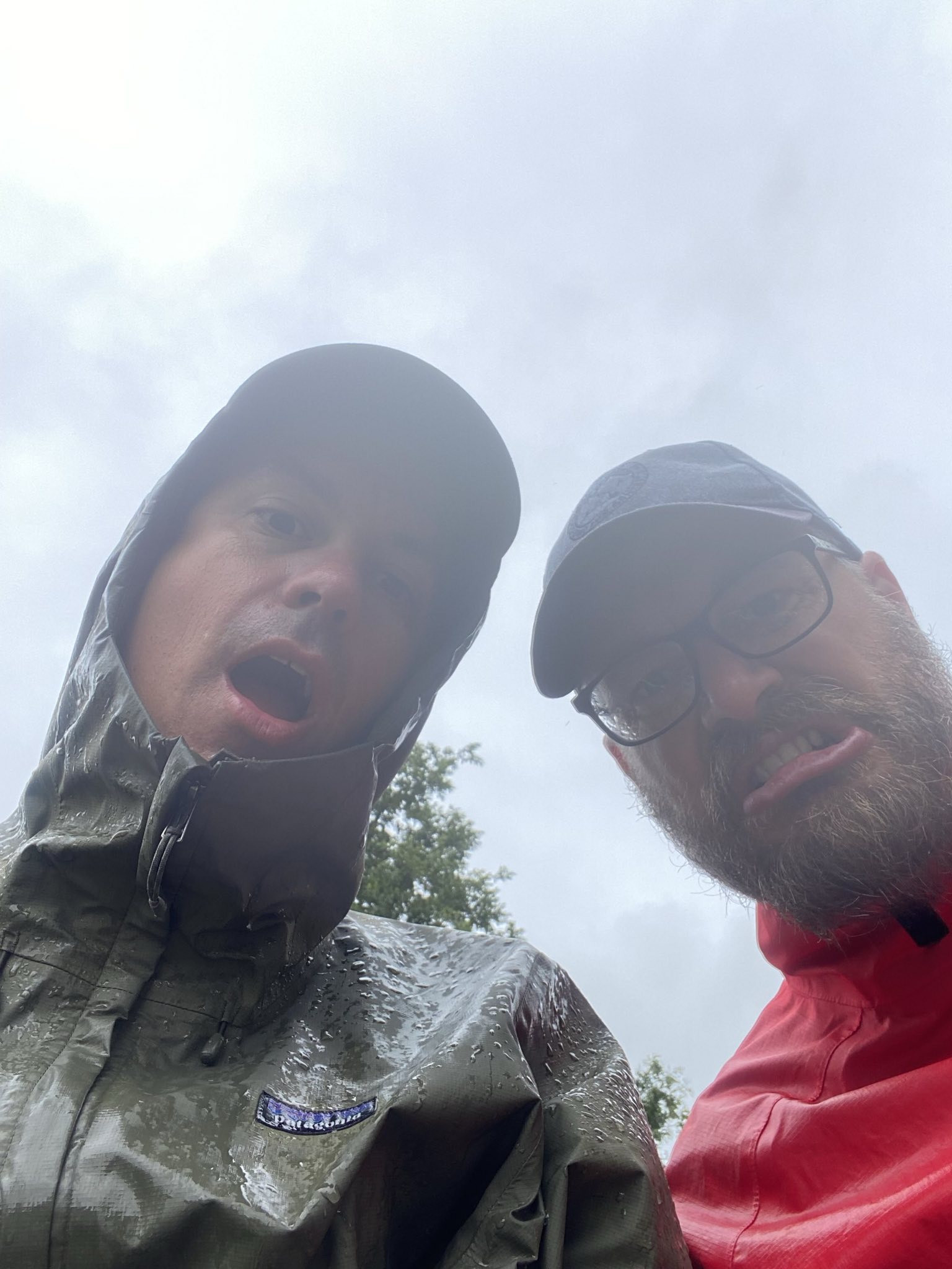 Mark and I taking a selfie in wet gear, looking very damp